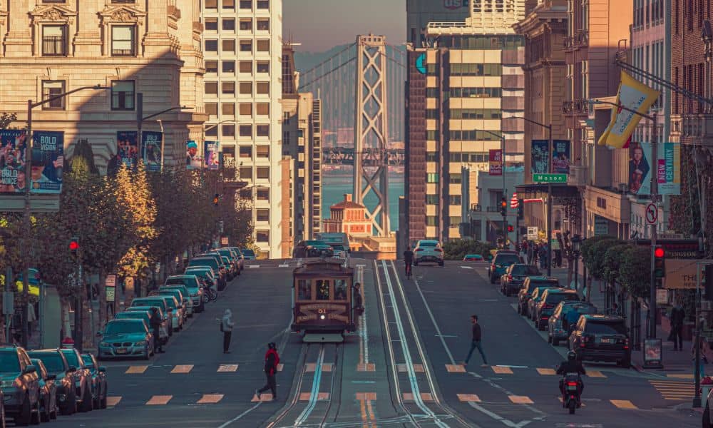 Street-level view of San Francisco with visible slope and city infrastructure, representing the importance of topographic surveys in green infrastructure planning.