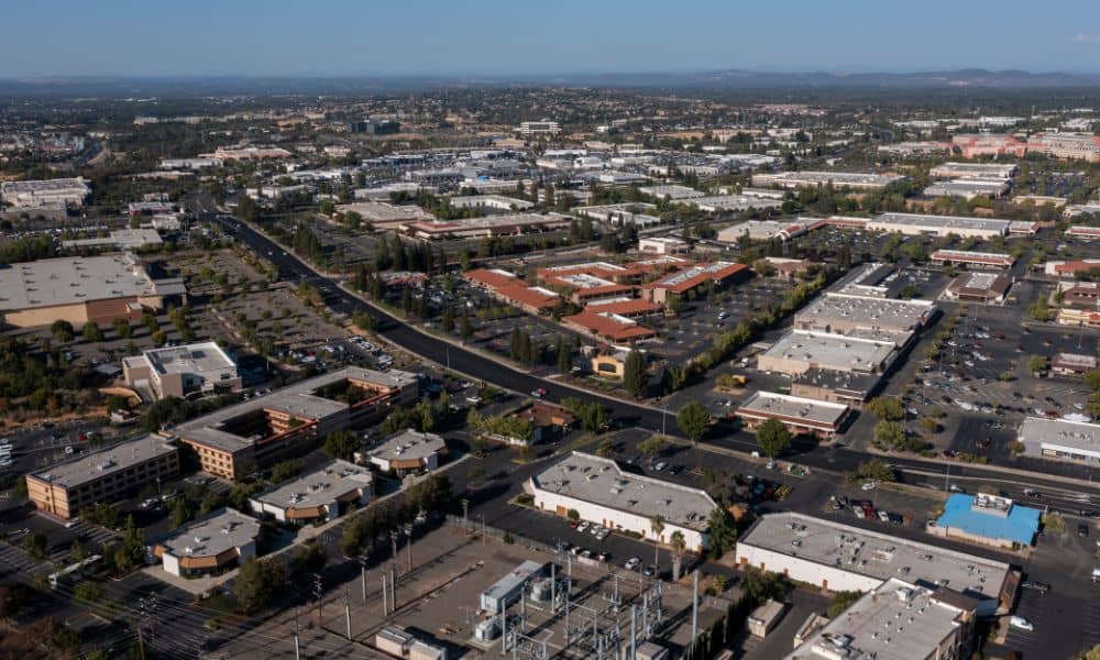 Aerial view of commercial and residential areas in Roseville, CA — showing urban development where land survey cost is often a key factor in property planning
