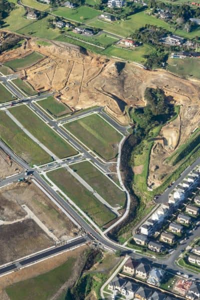  Aerial view of new subdivisions where boundary surveys guide land development
